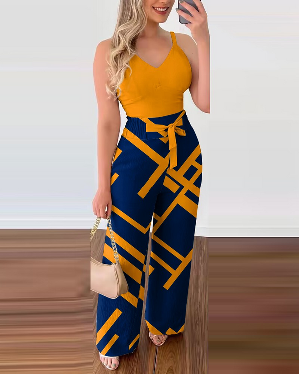 Introducing our stylish and chic Shirred Cami Top & Geometric Print High Waist Pants Set! Elevate your fashion game with this trendy ensemble that combines comfort and sophistication in one stunning package.